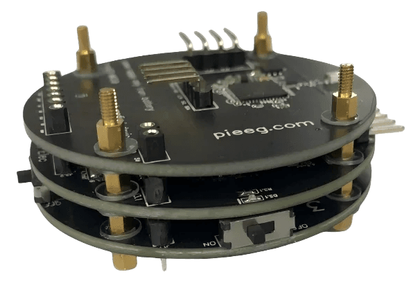 IronBCI board: three stacked round PCBs with pin headers and switches